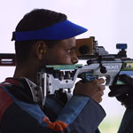Charan Singh of India on his way to winning gold in the Men's 50m Rifle 3 Position Singles Final during the 2002 Commonwealth Games in Bisley, England on August 3, 2002.   Craig Prentis/Getty Images