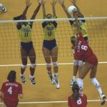Brazilian players (top) block a Russian spike during the women's volleyball match at the Centinnial Olympic Games in the Omni Coliseum in Atlanta, Georgia, America. Mike Hewitt /Allsport 